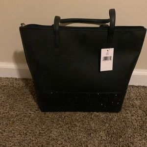 Black tote back with sparkles on the bottom half